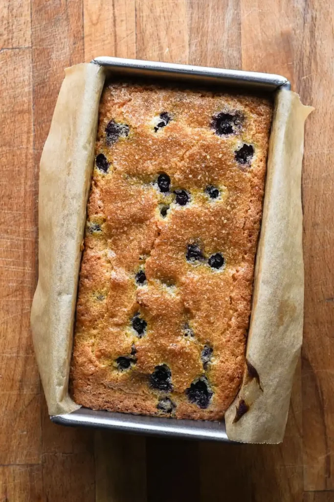 Freshly baked blueberry lemon mascarpone cake in loaf pan