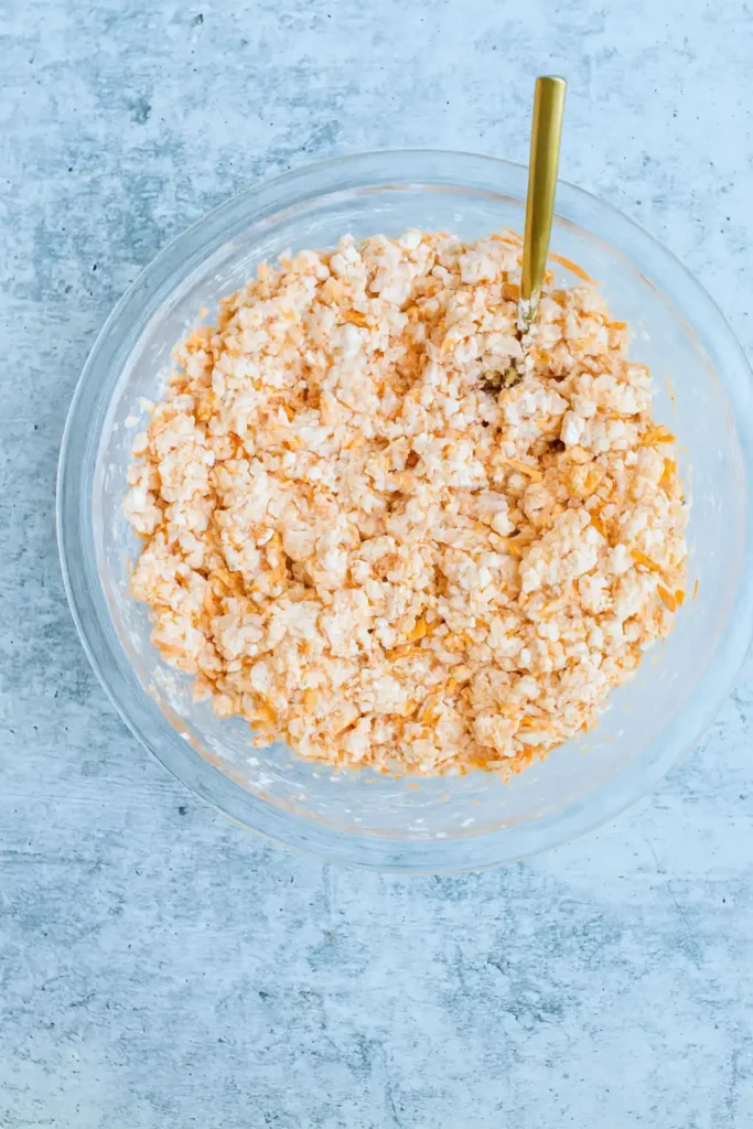 Mixing cottage cheese high protein buffalo chicken dip